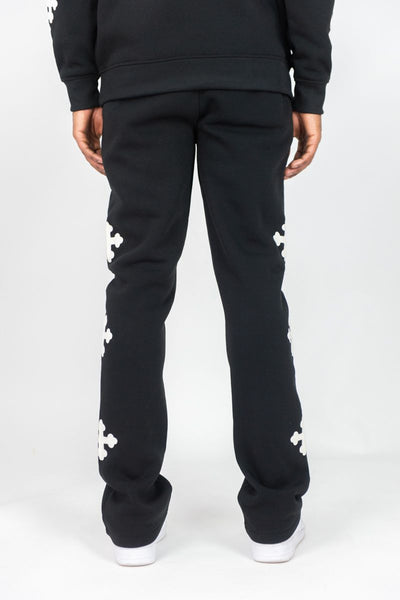 MEN BLACK REBEL CROSS FLEECE STACKED PANTS