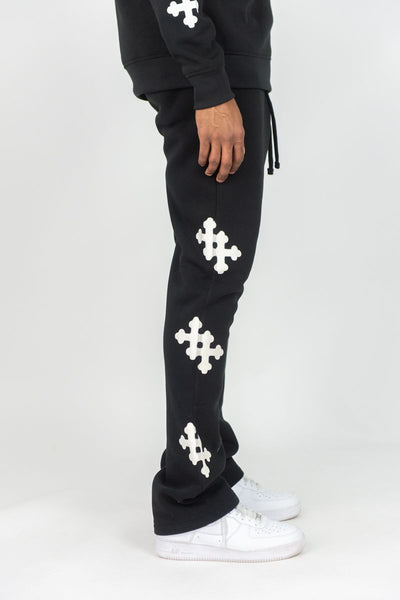 MEN BLACK REBEL CROSS FLEECE STACKED PANTS