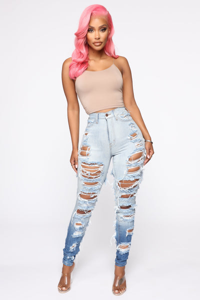 Blue faded Stretch jeans with holes